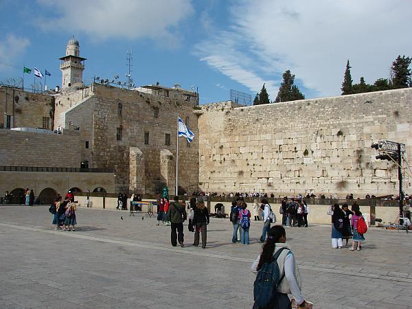 At the wall, men and women pray in separate sections. Men on the left, 